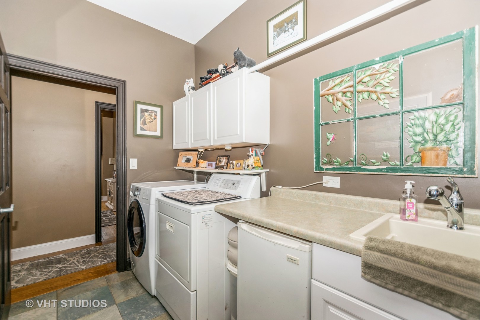 9424 West Pauling Road Monee, IL 60449 - Photo 10 of 19 a view of a sink and dishwasher with wooden floor