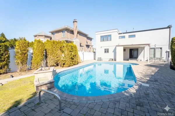 a view of a living room with a fireplace