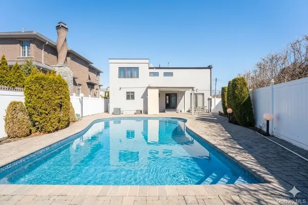 swimming pool view with a outdoor space