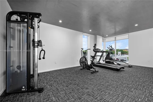 a view of a room with gym equipment