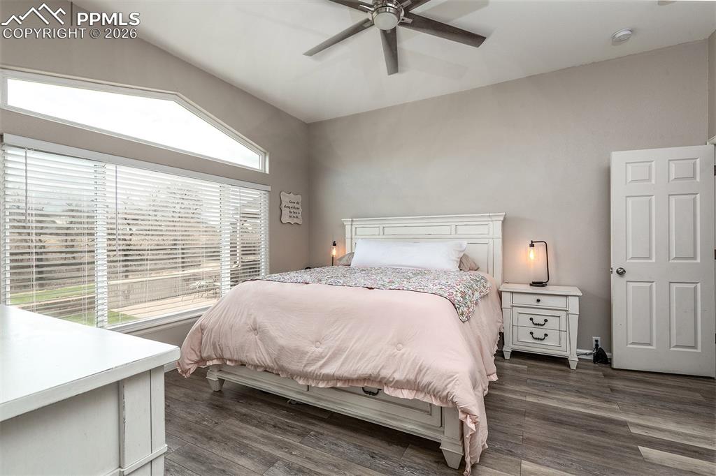 9066 Copenhagen Road Peyton, CO 80831 - Photo 13 of 34 a bedroom with a bed and a large window