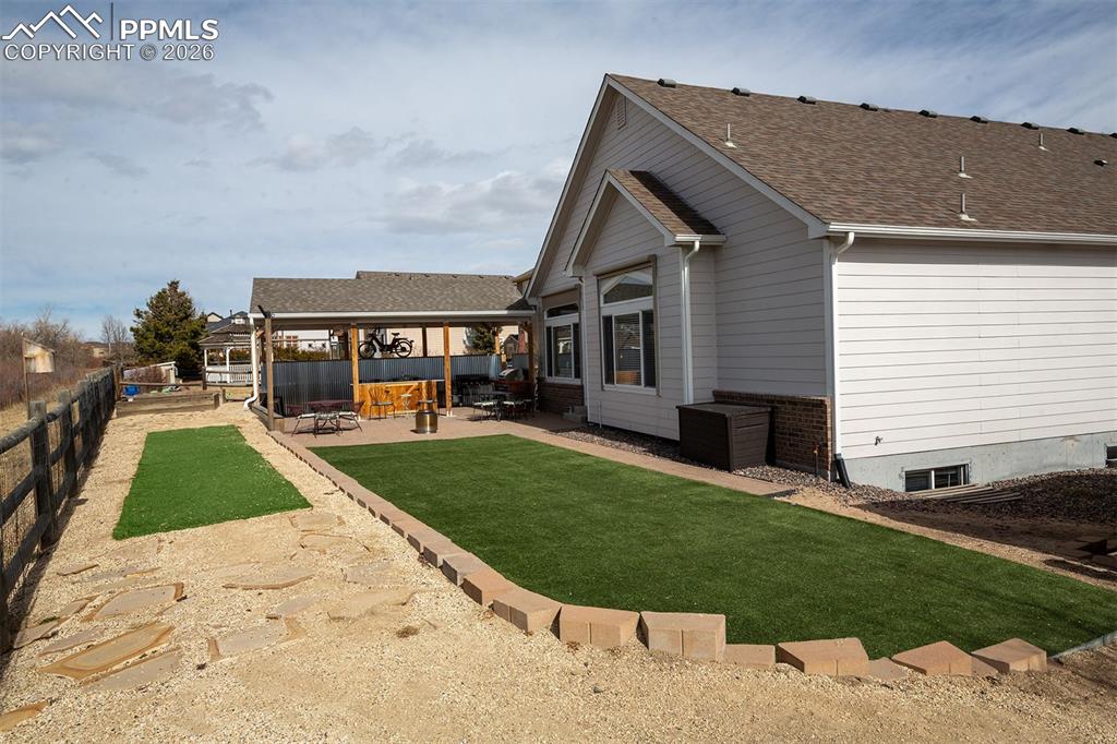 9066 Copenhagen Road Peyton, CO 80831 - Photo 24 of 34 a view of a yard in front of house