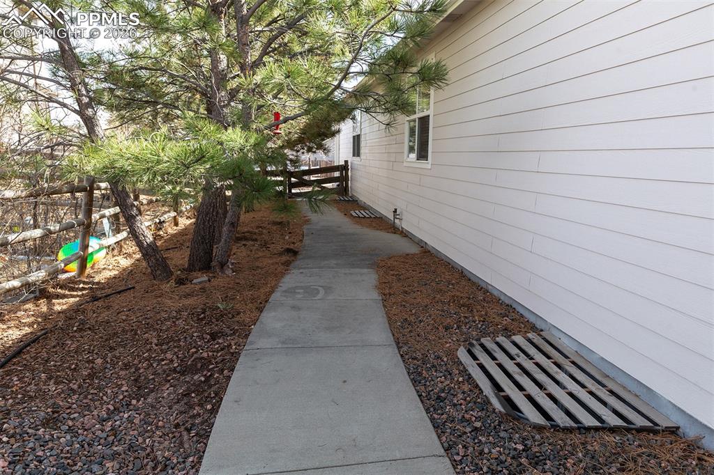 9066 Copenhagen Road Peyton, CO 80831 - Photo 25 of 34 a backyard of a house with lots of green space