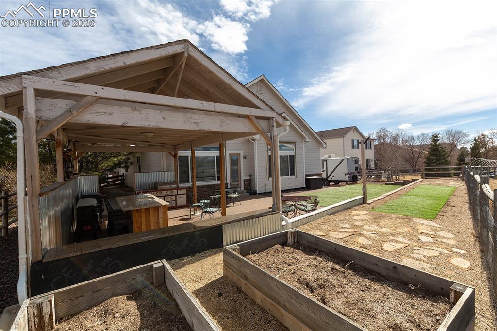 9066 Copenhagen Road Peyton, CO 80831 - Photo 26 of 34 a view of a living room and mountain view