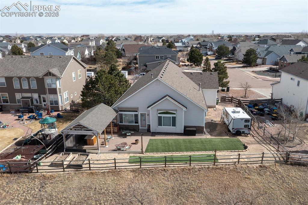9066 Copenhagen Road Peyton, CO 80831 - Photo 33 of 34 an aerial view of a house with a garden