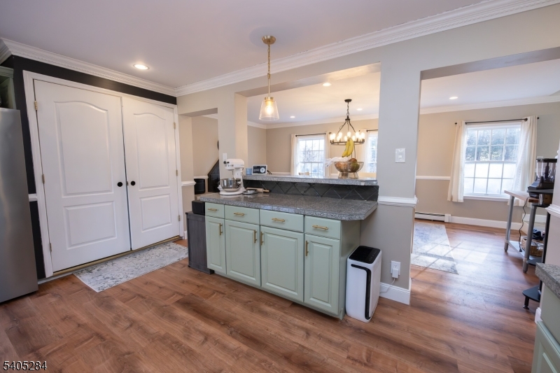 8 Luchetti Way Newton, NJ 07860 - Photo 13 of 20 a kitchen with a sink cabinets and wooden floor