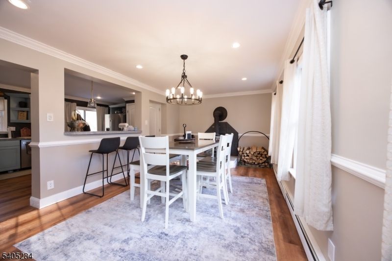 8 Luchetti Way Newton, NJ 07860 - Photo 8 of 20 a view of a dining room with furniture and chandelier