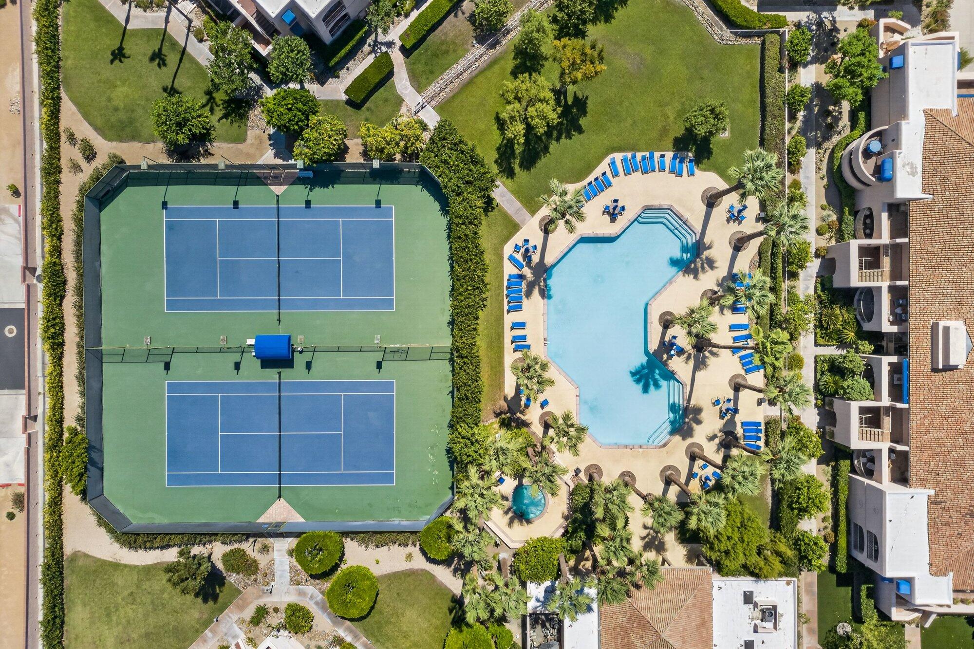 500 East Amado Road, Unit 313 Palm Springs, CA 92262 - Photo 28 of 32 an aerial view of a house with a yard