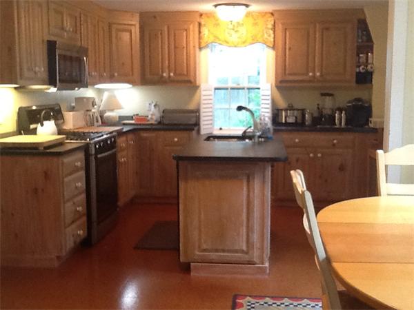 1 Turkey Shore Road Ipswich, MA 01938 - Photo 2 of 13 a kitchen with a sink cabinets and window