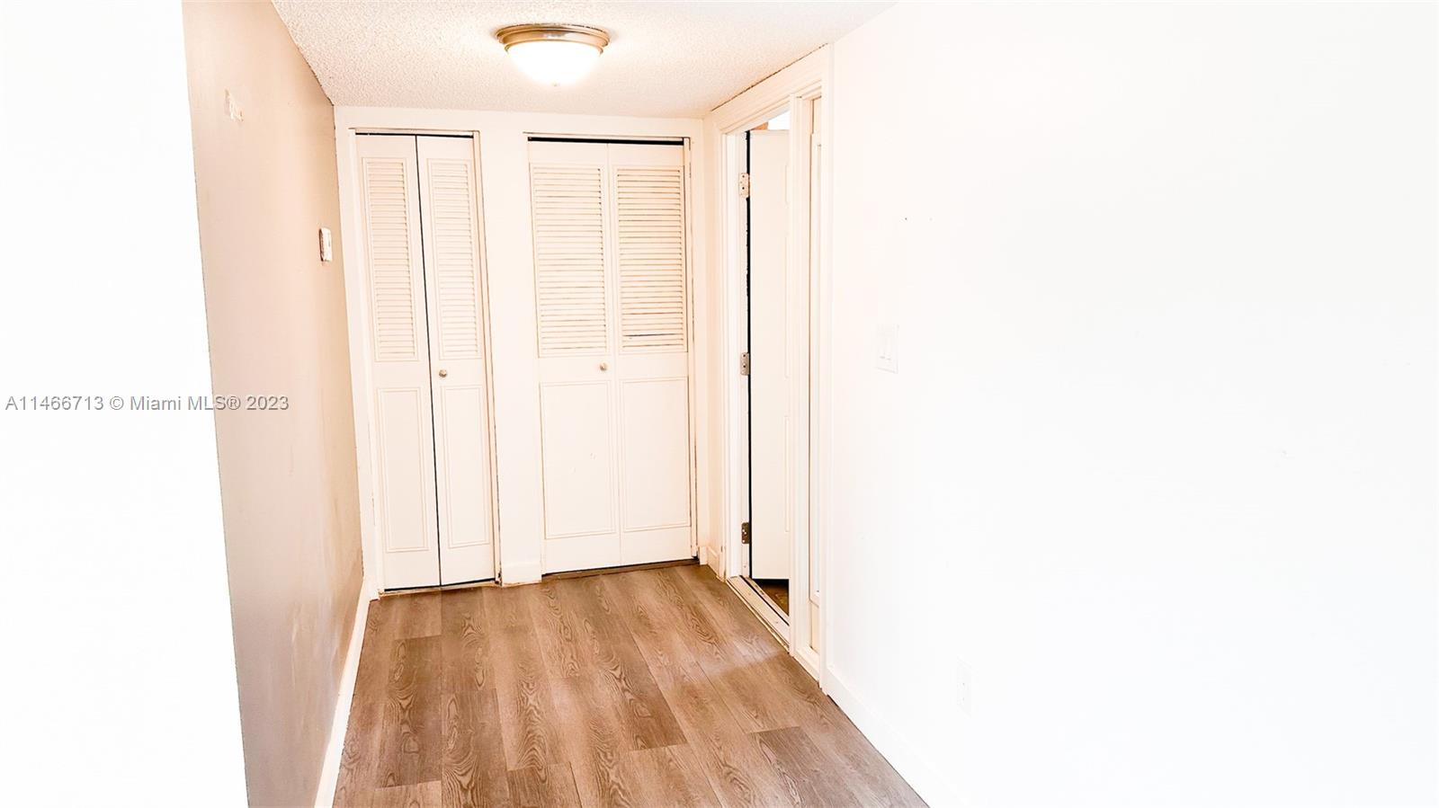 California Club Miami, FL 33179 - Photo 16 of 40 a view of a room with wooden floor