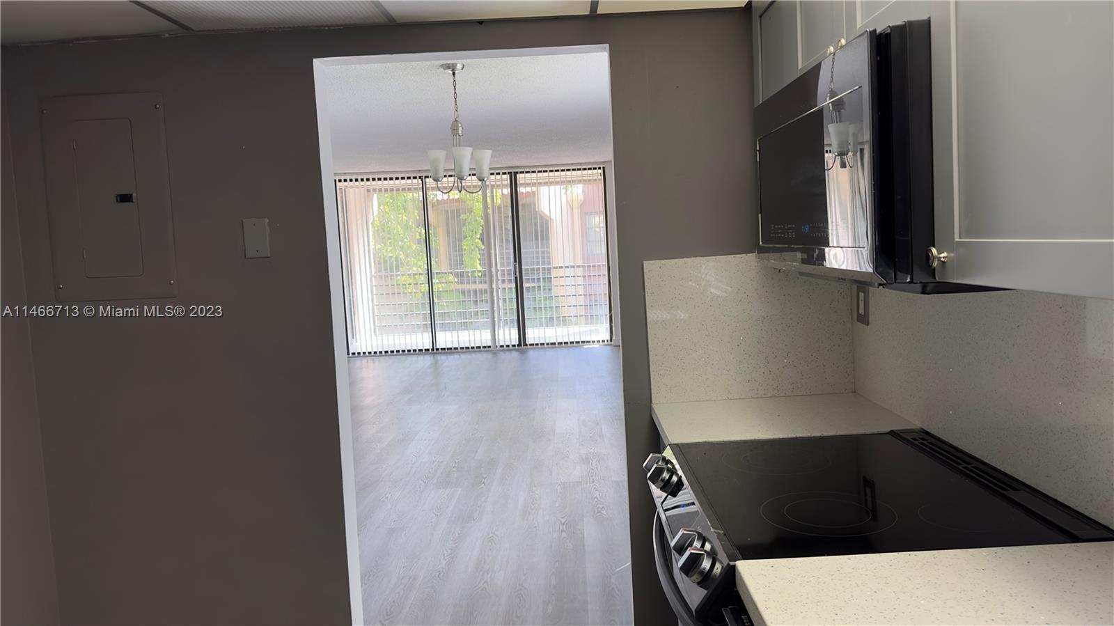 California Club Miami, FL 33179 - Photo 27 of 40 a view of empty room with wooden floor and fan