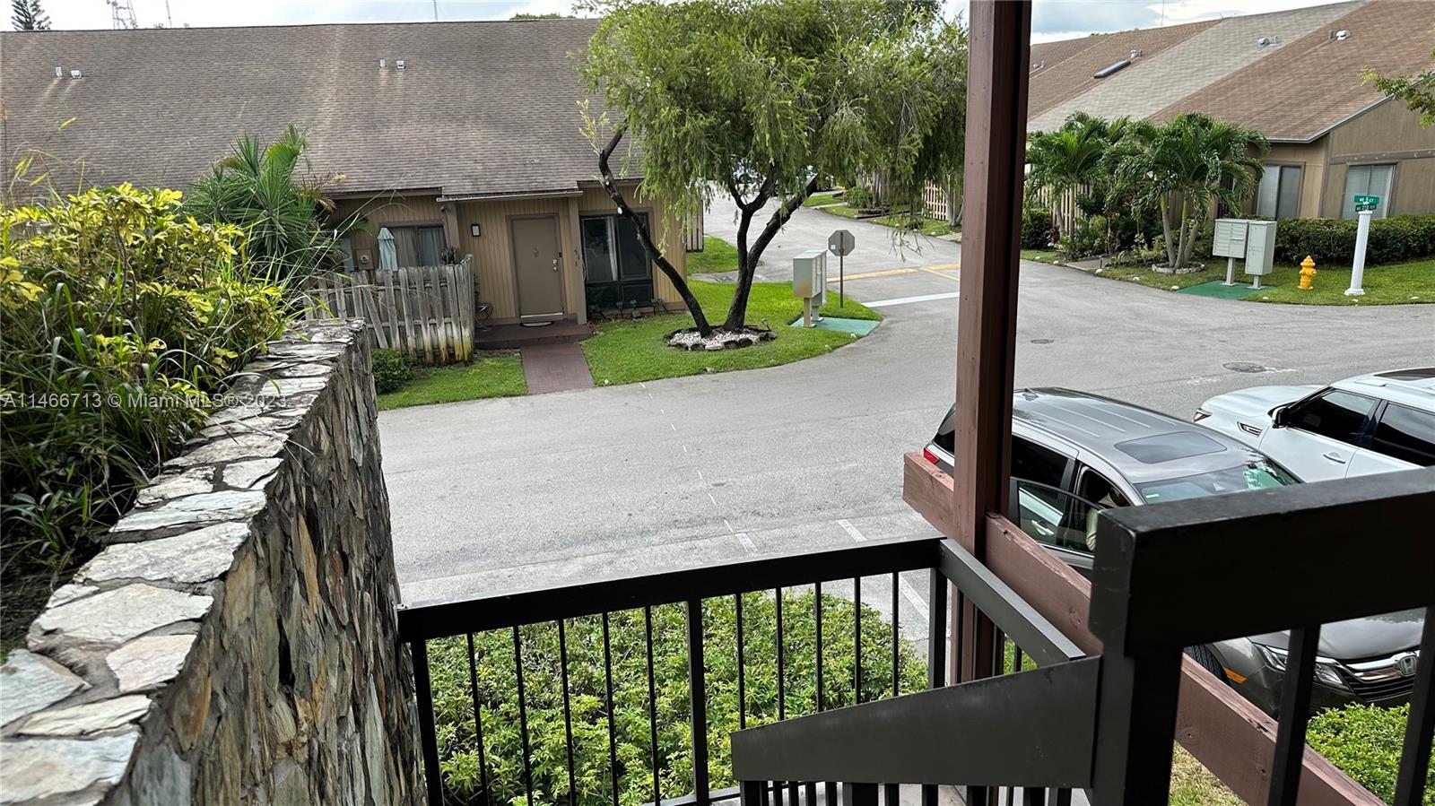 California Club Miami, FL 33179 - Photo 3 of 40 a view of a porch with a small yard