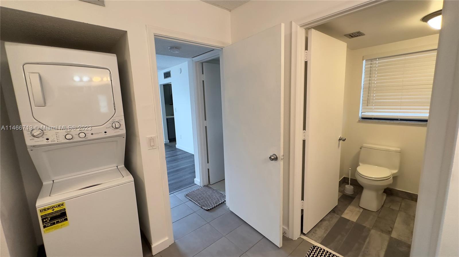California Club Miami, FL 33179 - Photo 34 of 40 a view of a bathroom with a toilet and a hardwood floor