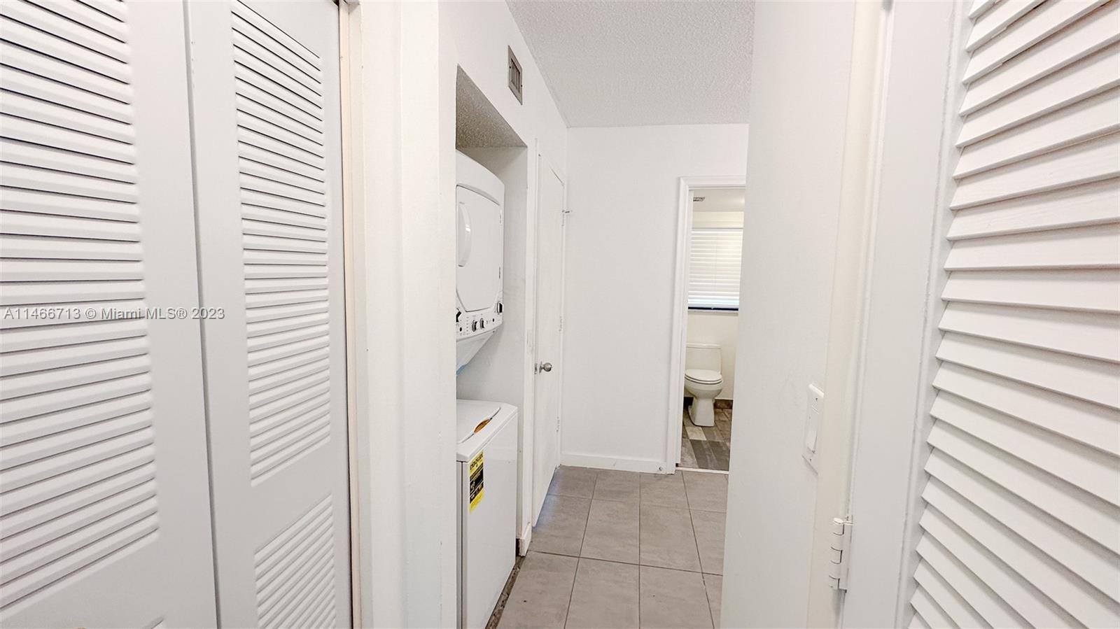 California Club Miami, FL 33179 - Photo 9 of 40 a bathroom with a shower and a sink