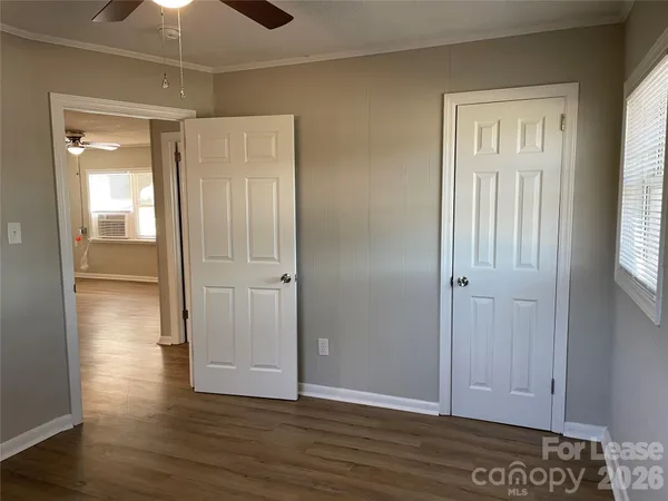 a view of entryway with wooden floor