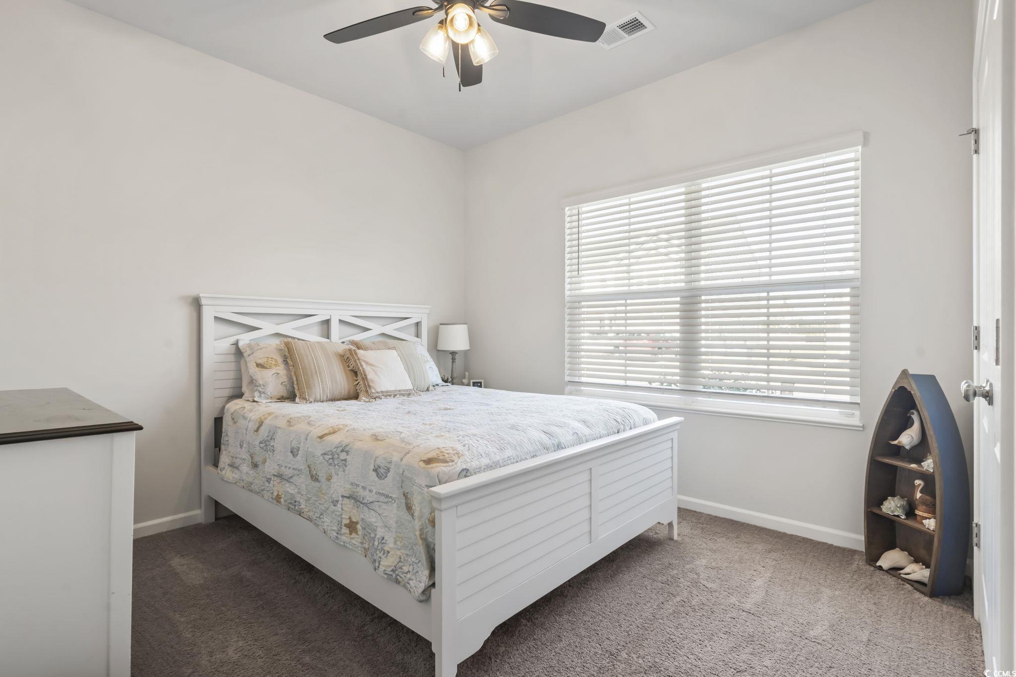 1310 Boswell Court Conway, SC 29526 - Photo 14 of 35 Carpeted bedroom featuring baseboards and a ceiling fan