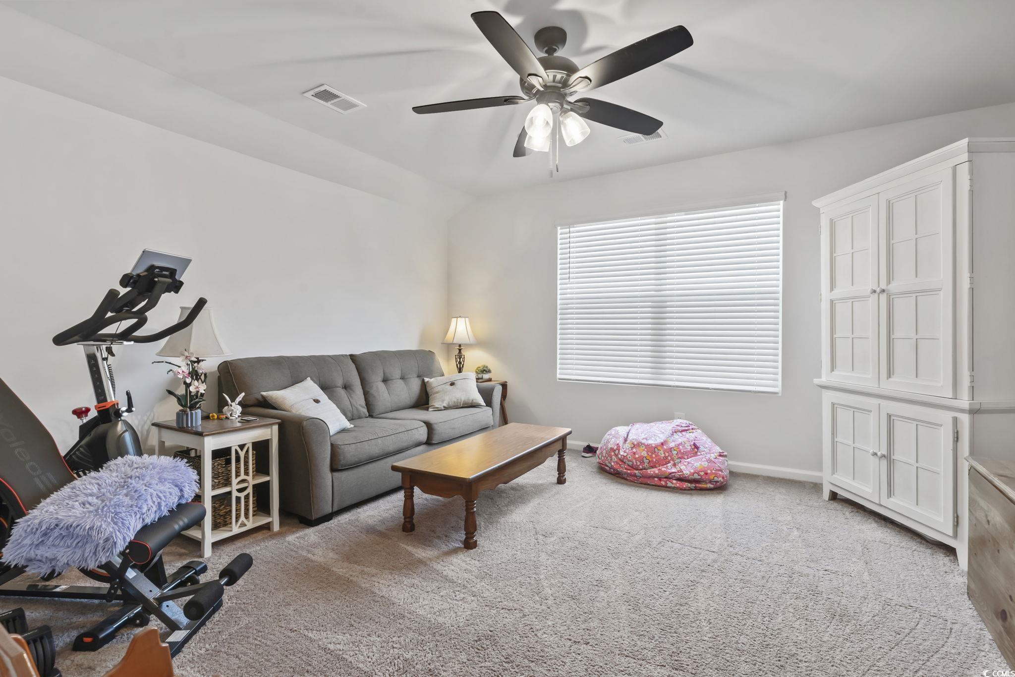 1310 Boswell Court Conway, SC 29526 - Photo 16 of 35 light colored carpet and a ceiling fan