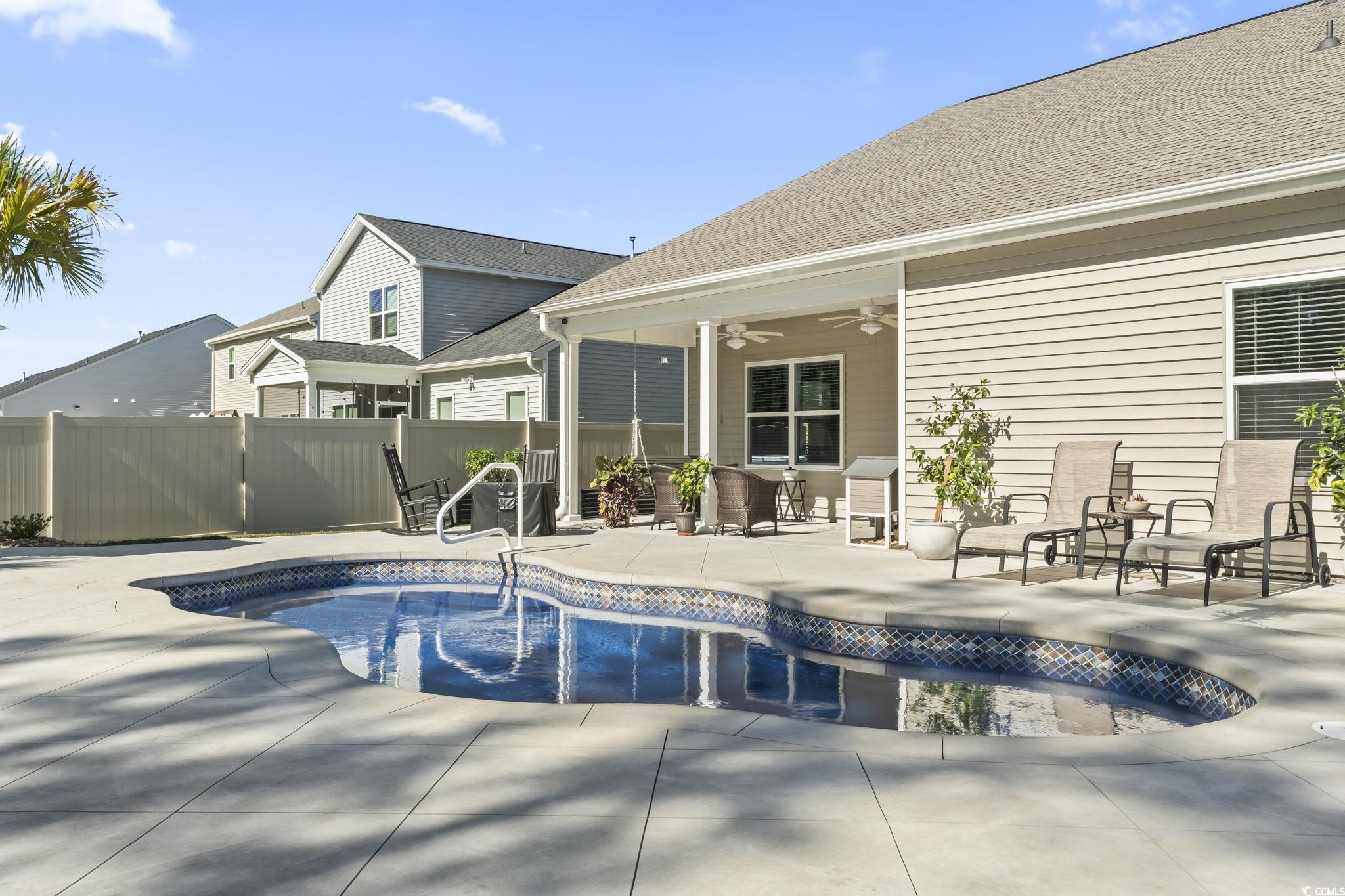 1310 Boswell Court Conway, SC 29526 - Photo 2 of 35 View of pool featuring ceiling fan and a patio