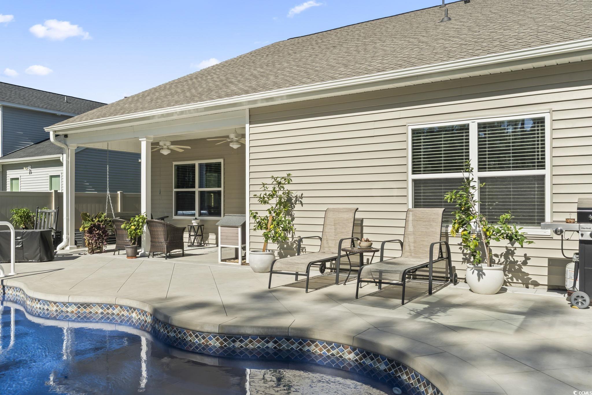 1310 Boswell Court Conway, SC 29526 - Photo 24 of 35 View of patio / terrace featuring a ceiling fan, an outdoor pool, and area for grilling