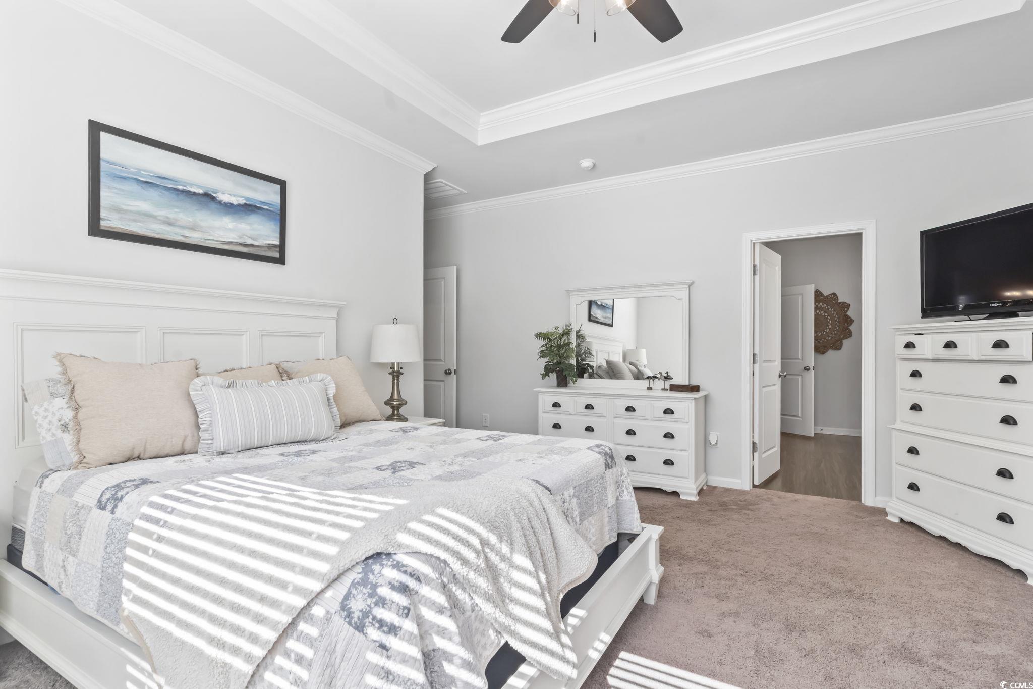 1310 Boswell Court Conway, SC 29526 - Photo 8 of 35 Bedroom featuring ornamental molding, light colored carpet, and a ceiling fan
