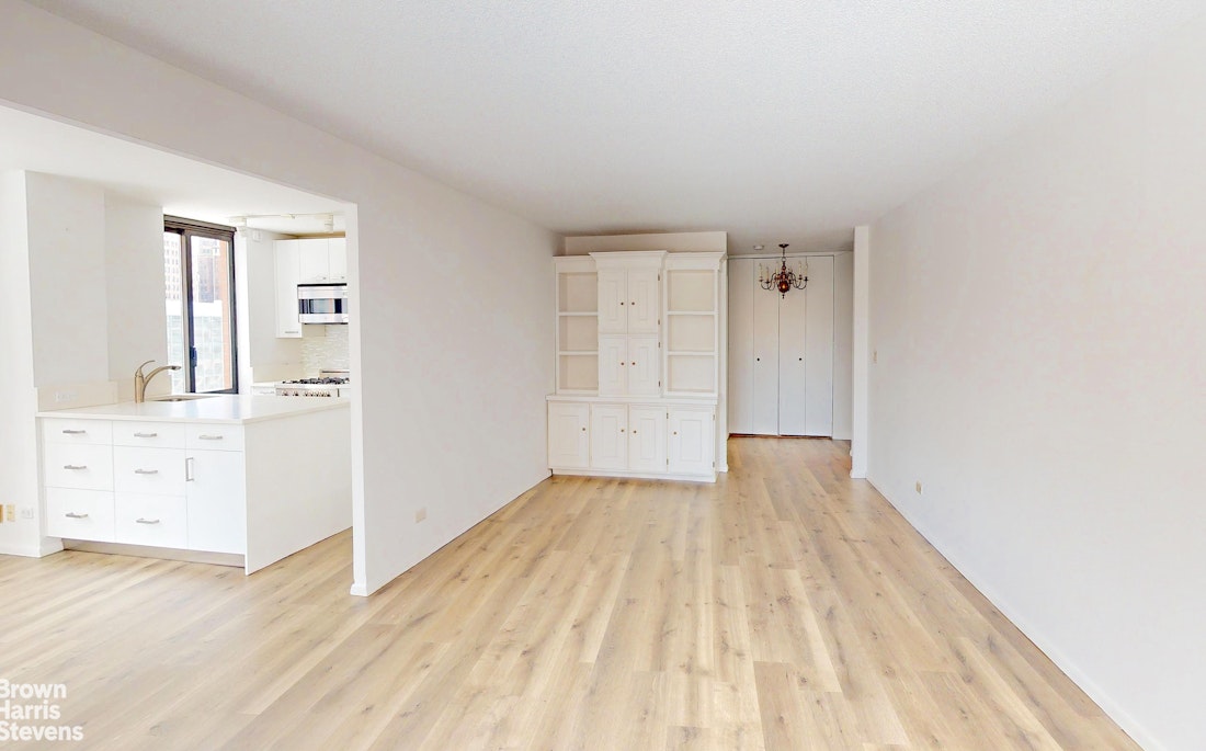 200 Rector Place, Unit 8U Manhattan, NY 10280 - Photo 8 of 25 wooden floor in a room