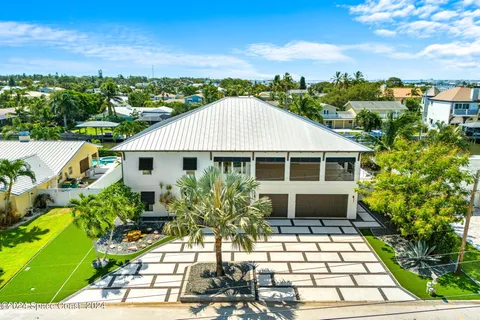 a view of a livingroom with furniture and a chandelier