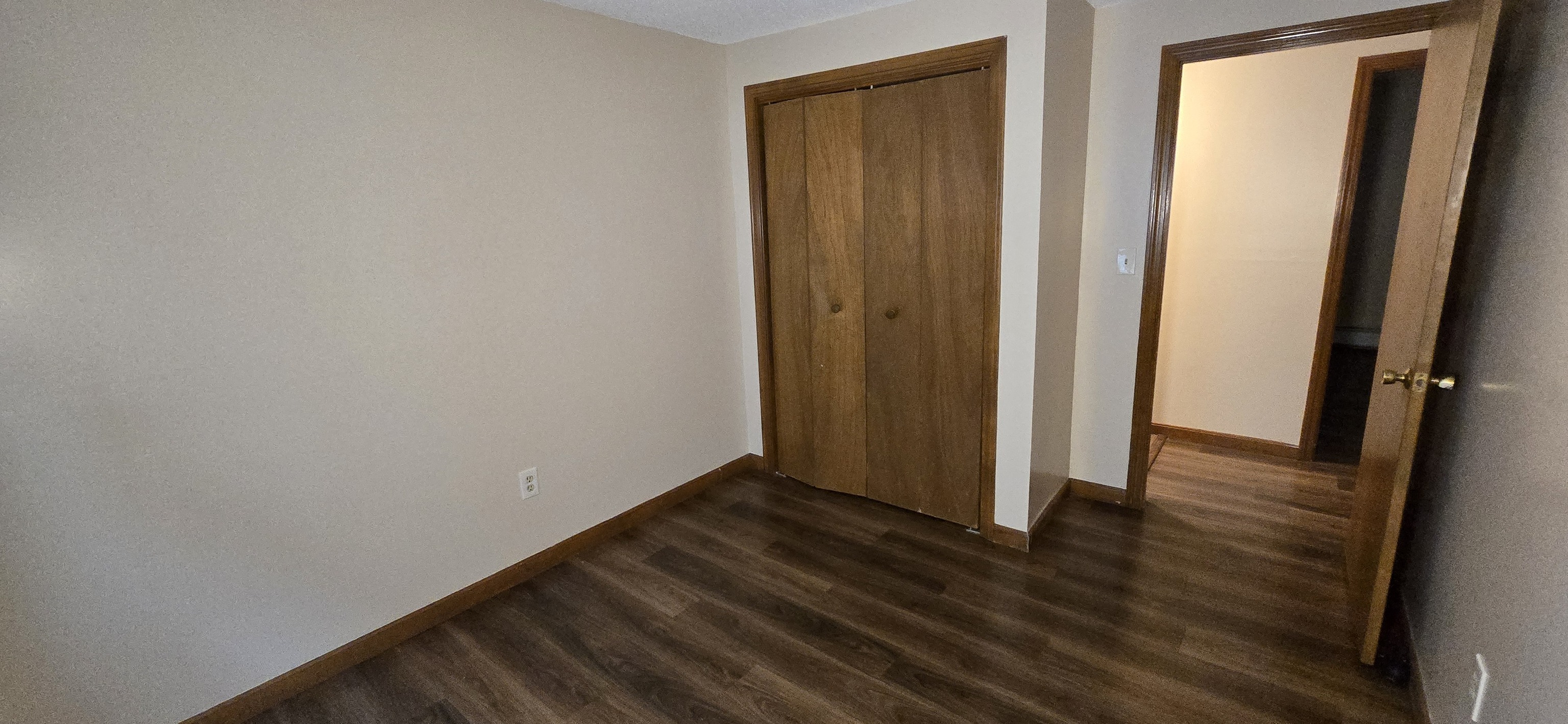 2319 Main Street Hartford, CT 06120 - Photo 5 of 9 a view of an empty room with wooden floor