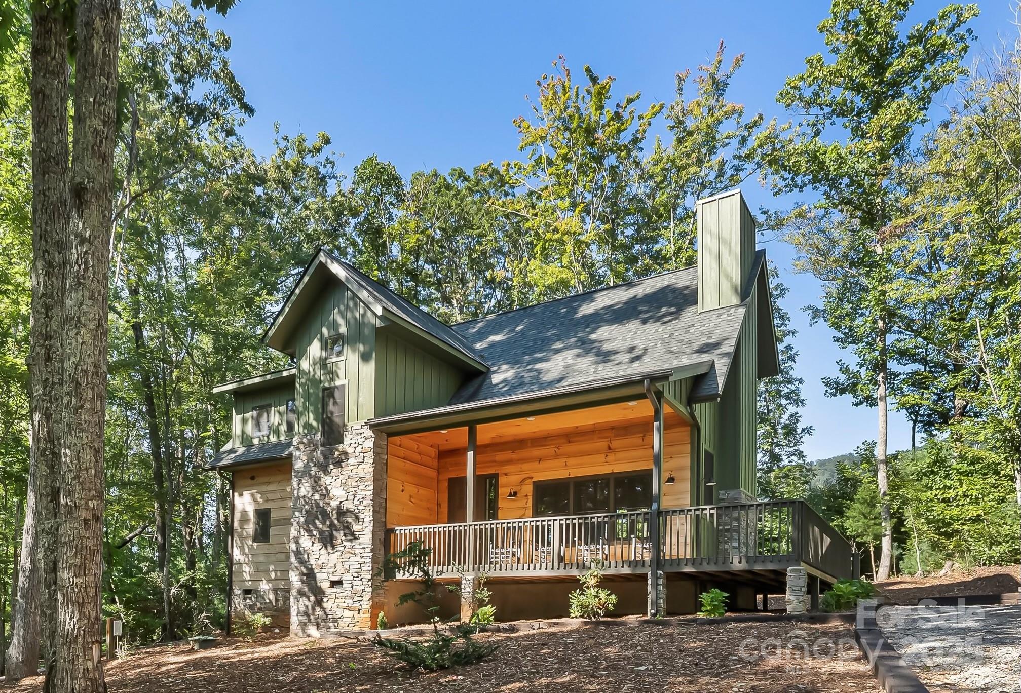 a tall building with a tree in front of it