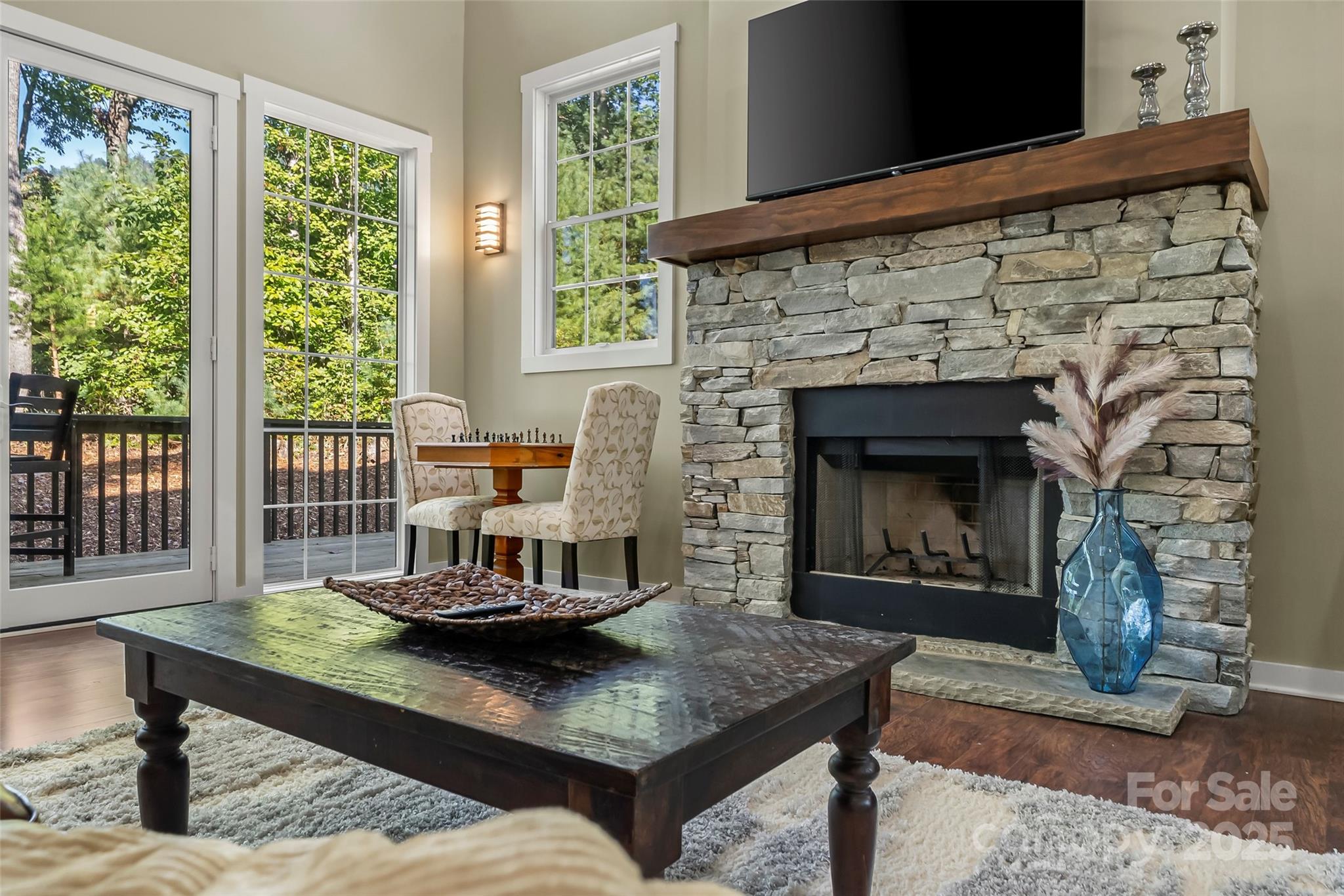 90 Clinchfield Gap Road Marion, NC 28752 - Photo 13 of 42 a living room with furniture and a fireplace