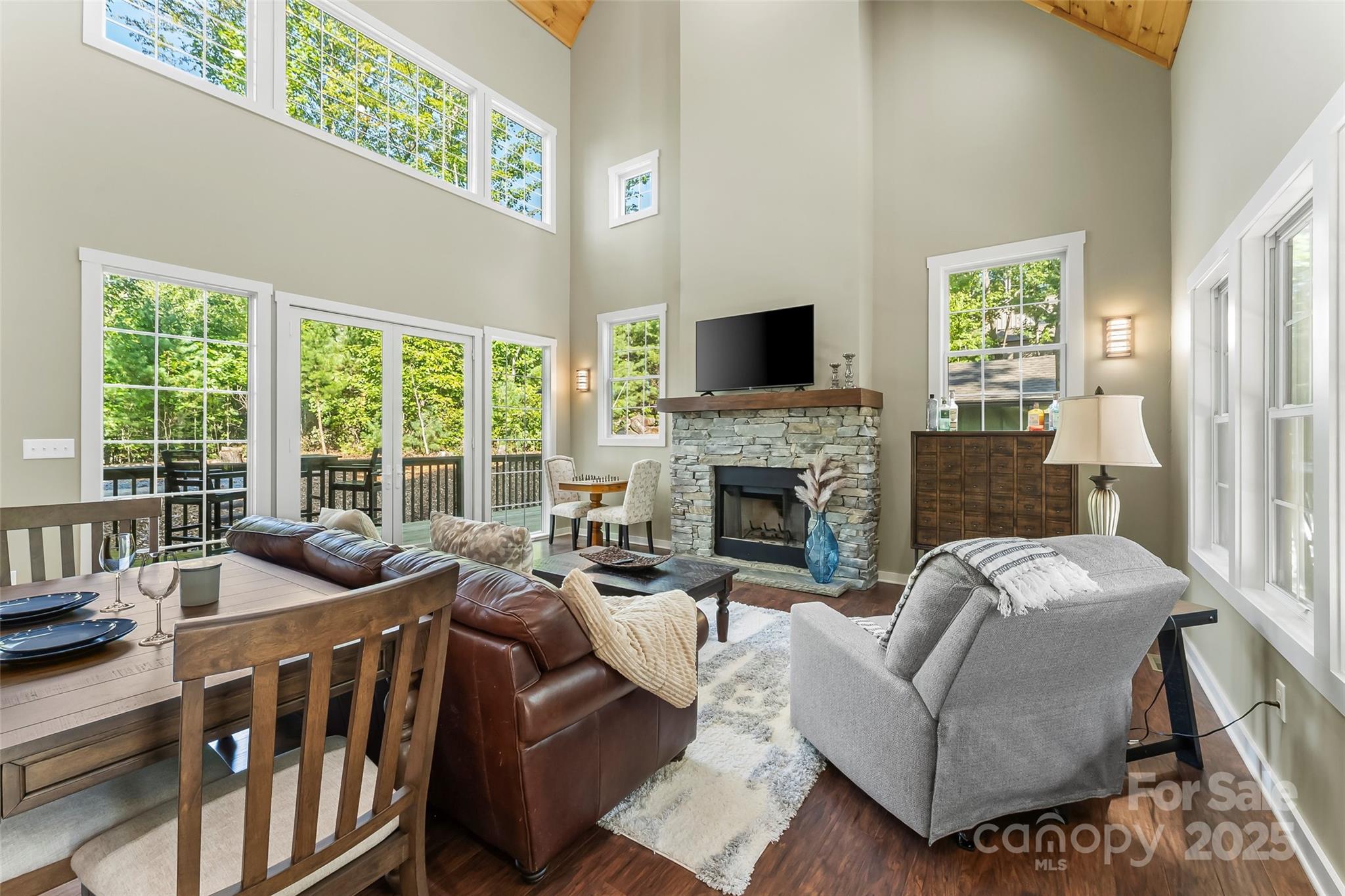 90 Clinchfield Gap Road Marion, NC 28752 - Photo 15 of 42 a living room with furniture fireplace and flat screen tv