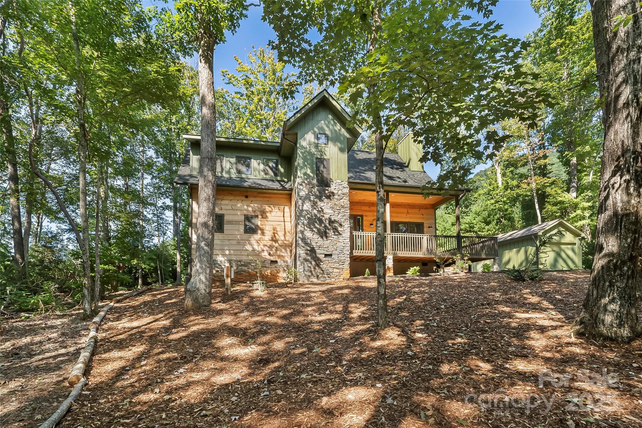 90 Clinchfield Gap Road Marion, NC 28752 - Photo 2 of 42 a view of a house with a tree