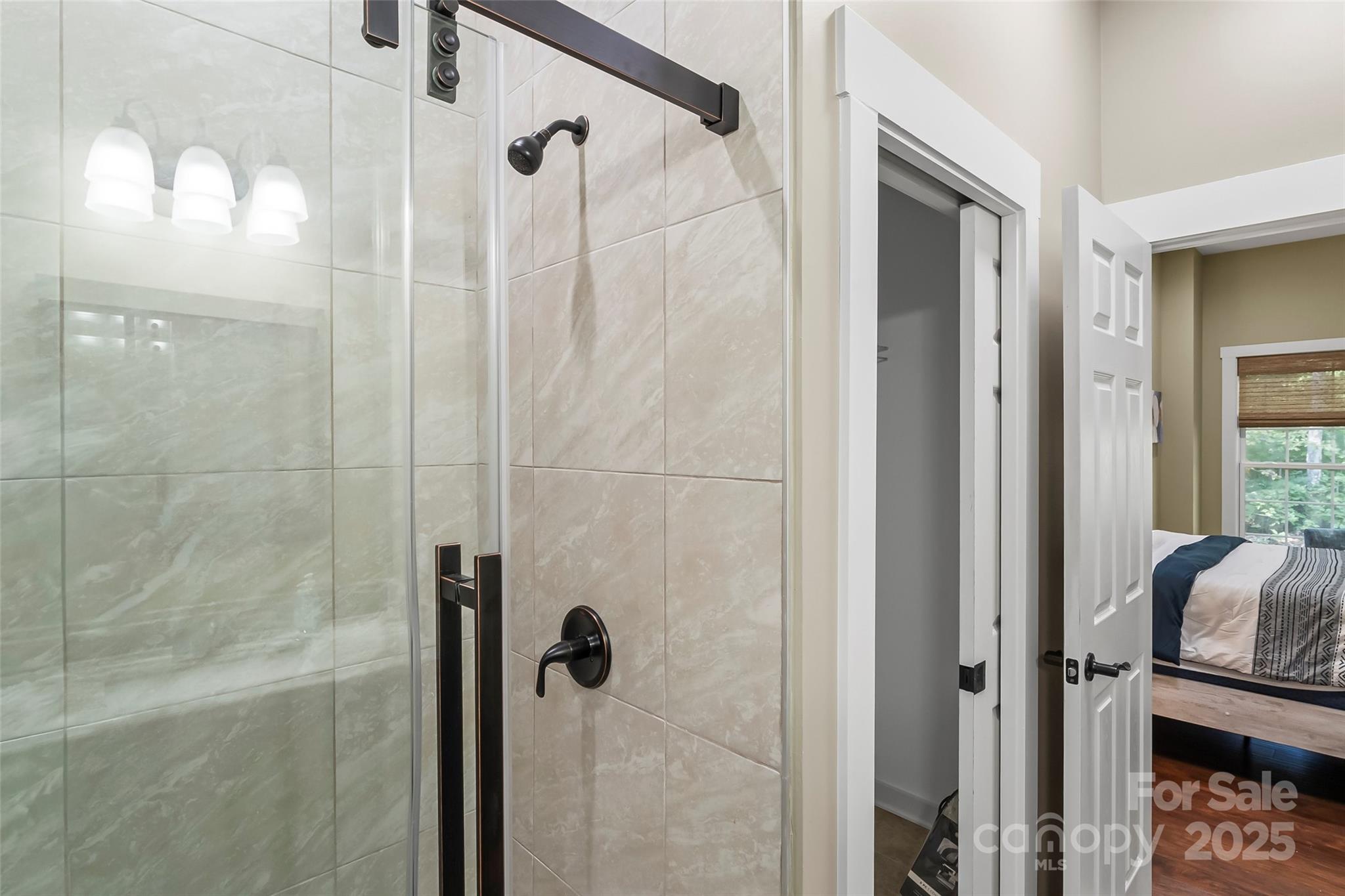 90 Clinchfield Gap Road Marion, NC 28752 - Photo 21 of 42 a bathroom with a shower
