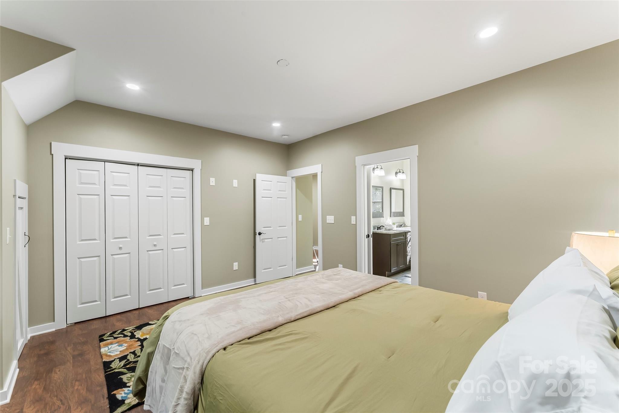 90 Clinchfield Gap Road Marion, NC 28752 - Photo 28 of 42 a bedroom with a bed and closet