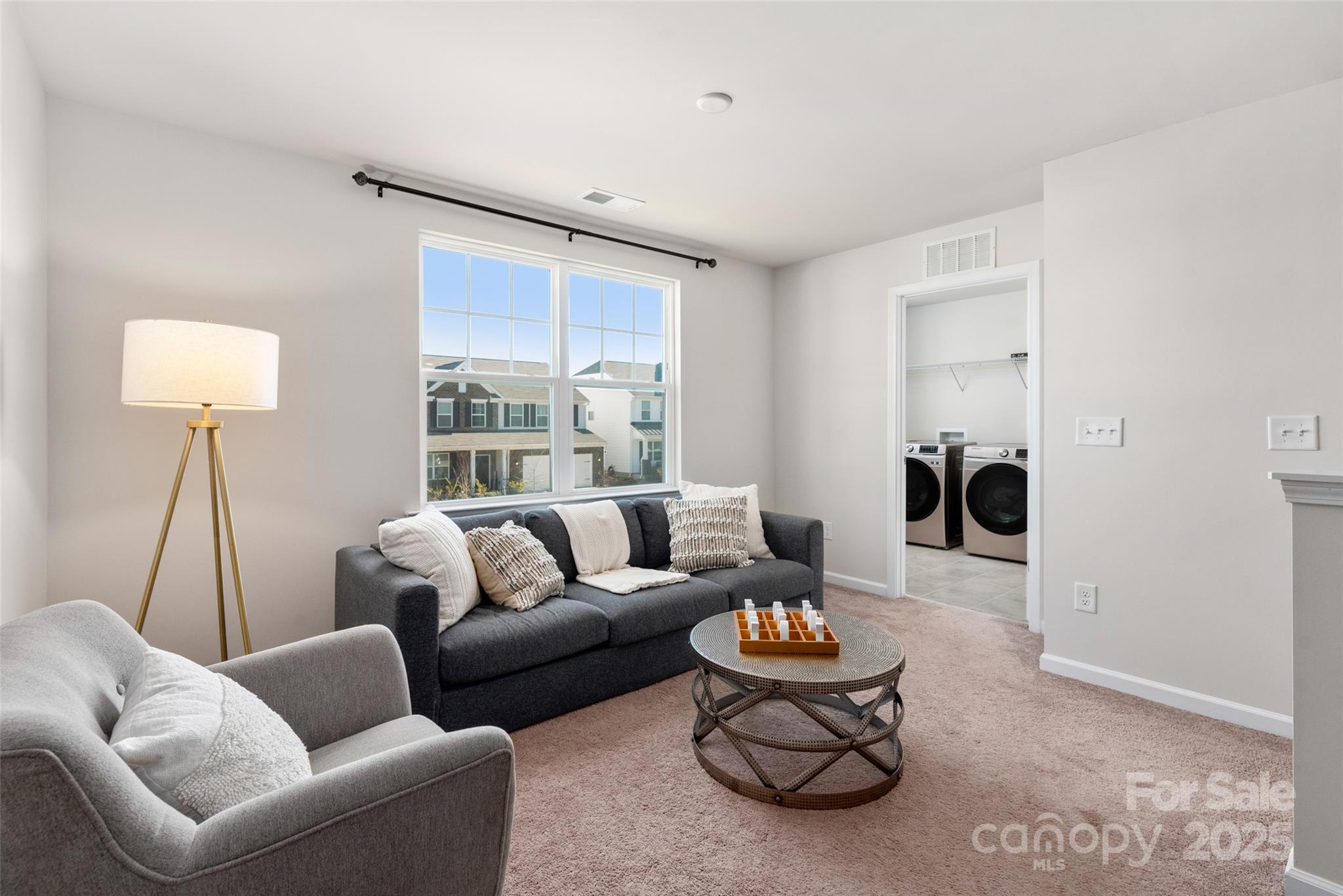 2547 Bullfrog Lane Lancaster, SC 29720 - Photo 21 of 47 a living room with furniture and a large window