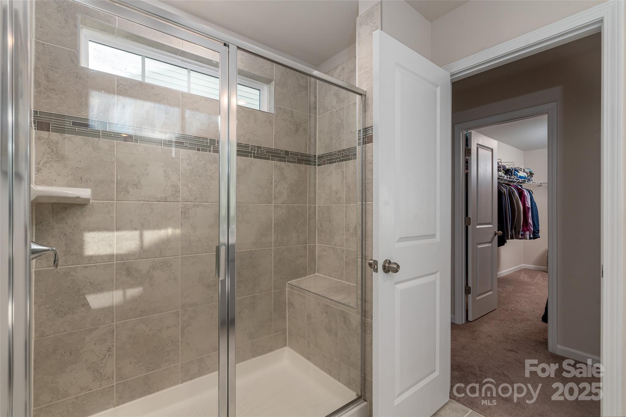 2547 Bullfrog Lane Lancaster, SC 29720 - Photo 26 of 47 a bathroom with a glass shower door
