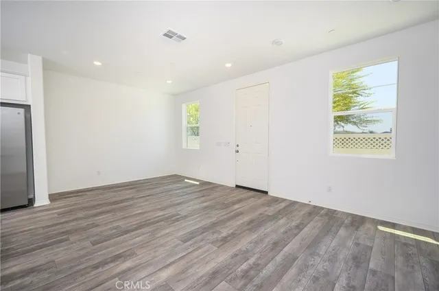 an empty room with windows