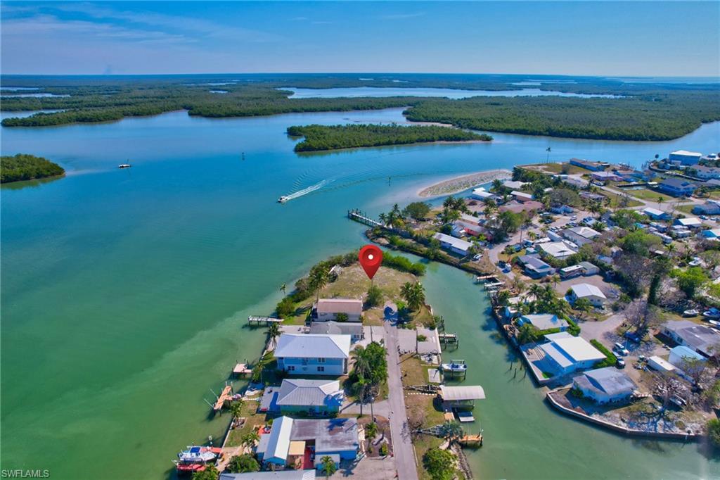 103 Bayshore Way Goodland, FL 34140 - Photo 10 of 16 Drone / aerial view featuring a water view