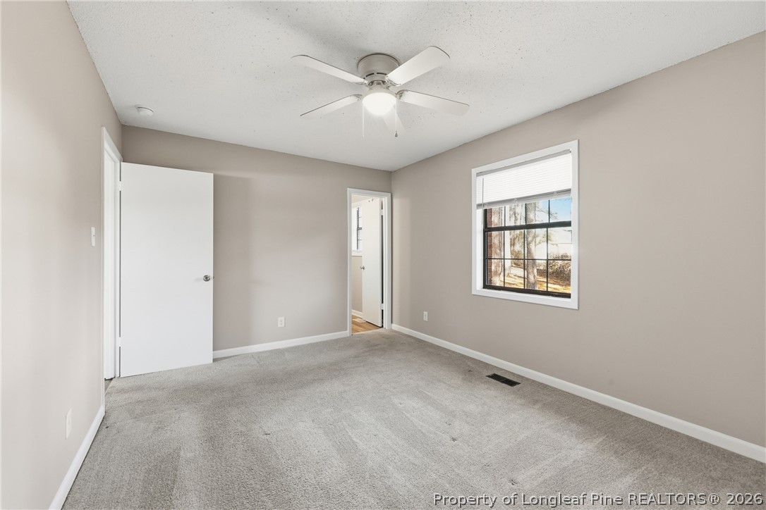 1304 Chara Court Spring Lake, NC 28390 - Photo 19 of 33 a view of an empty room with a window
