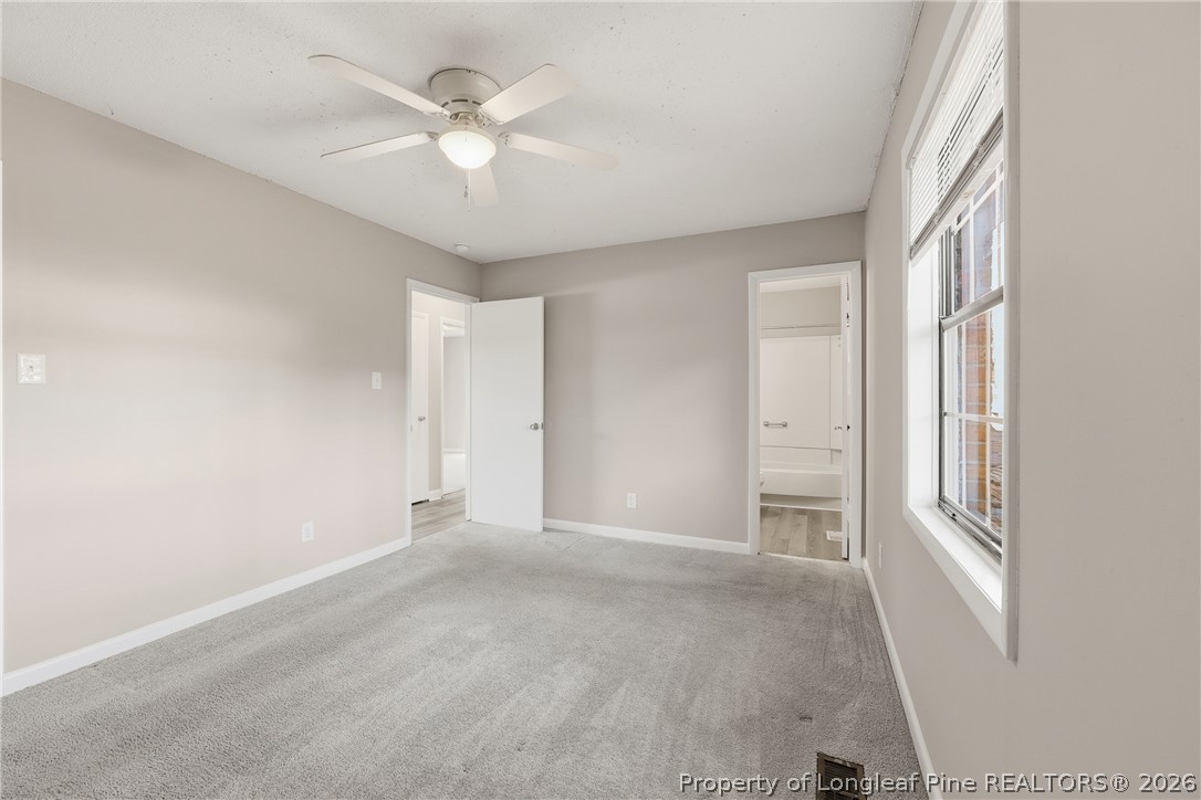 1304 Chara Court Spring Lake, NC 28390 - Photo 20 of 33 a view of an empty room with a window
