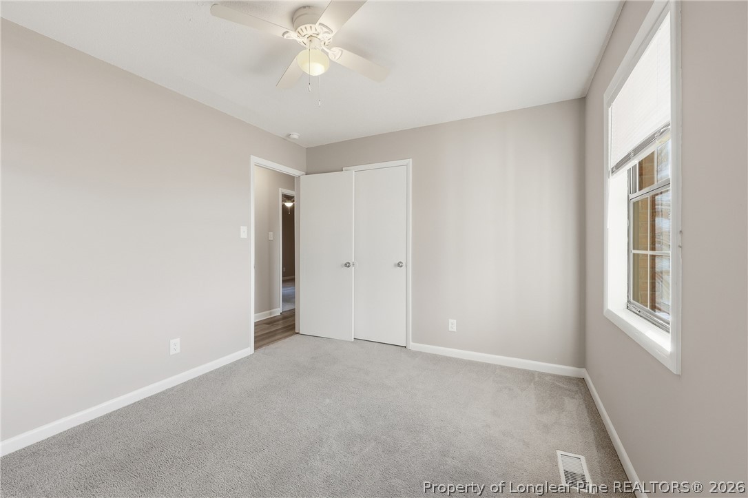 1304 Chara Court Spring Lake, NC 28390 - Photo 24 of 33 a view of an empty room with a window