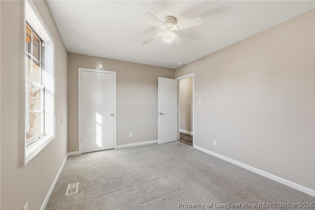 1304 Chara Court Spring Lake, NC 28390 - Photo 28 of 33 a view of an empty room with a window