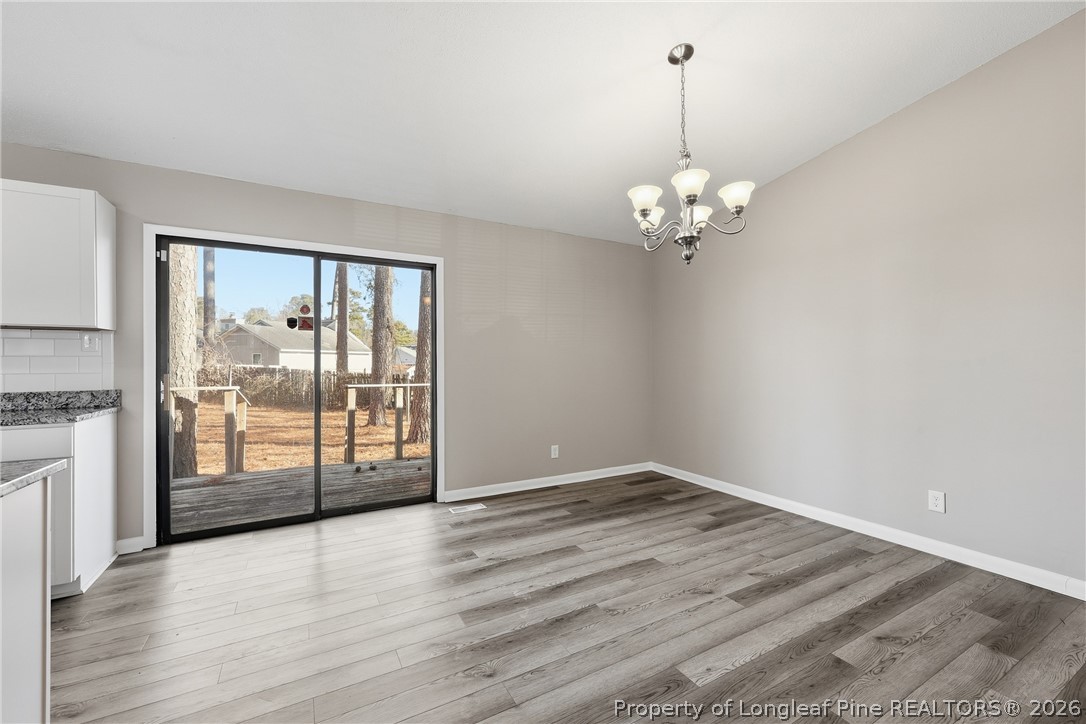 1304 Chara Court Spring Lake, NC 28390 - Photo 10 of 33 a view of an empty room with a window