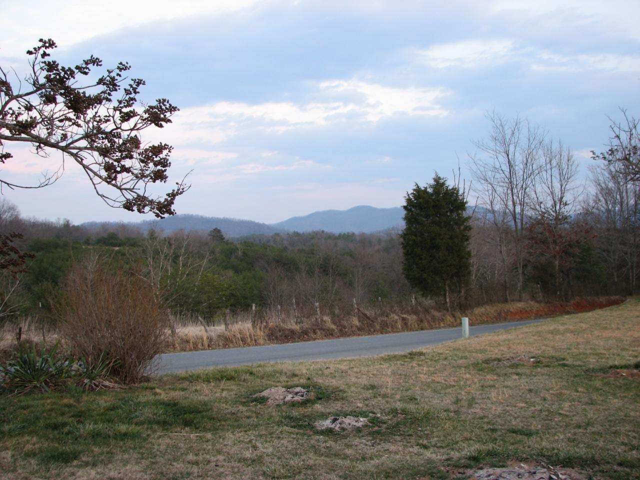 473 Slapp Creek Road Amherst, VA 24521 - Photo 2 of 5 a view of a lake with a mountain in the background