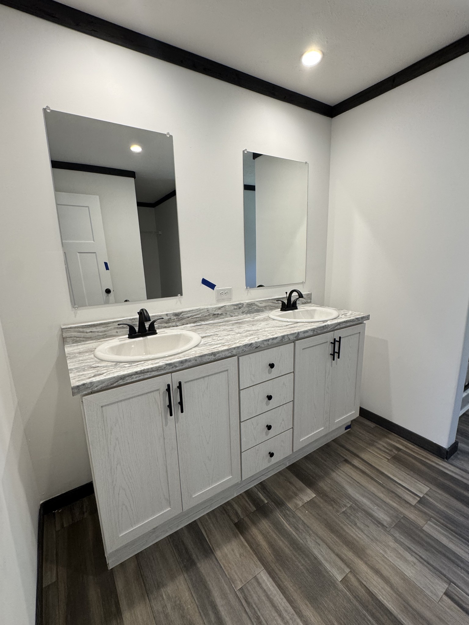 2066 Anderson Road Monterey, TN 38574 - Photo 11 of 18 a bathroom with a double vanity sink and mirror