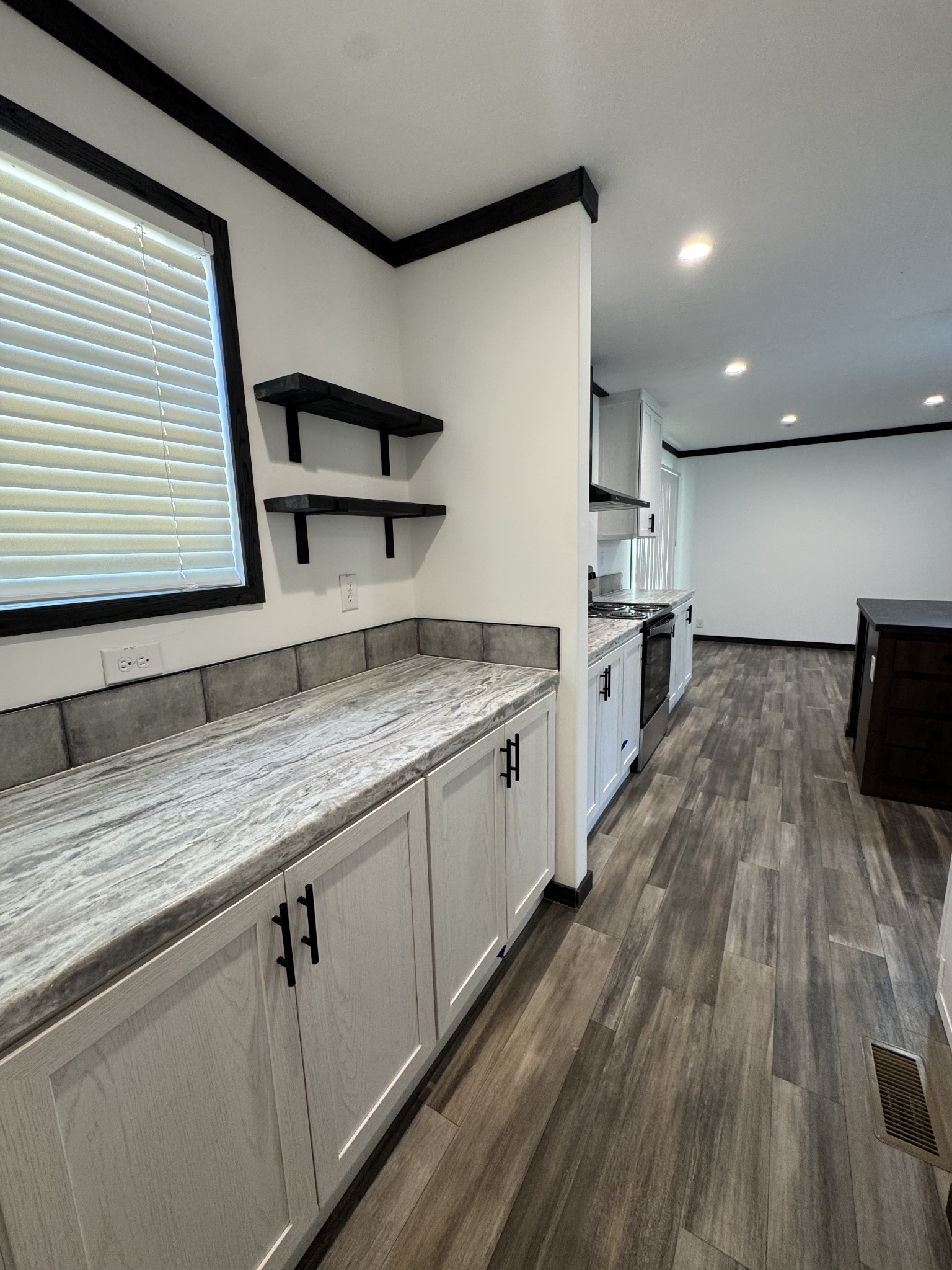 2066 Anderson Road Monterey, TN 38574 - Photo 15 of 18 a kitchen with a sink and wooden floor