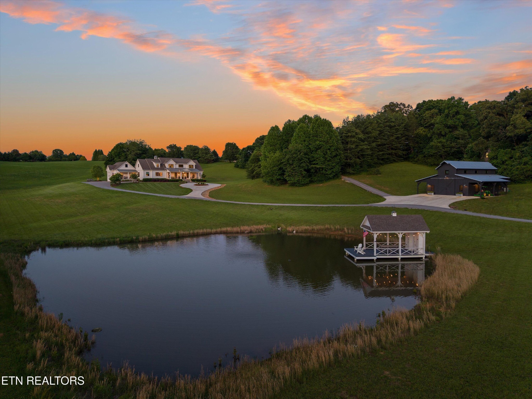 a view of a lake with a big yard