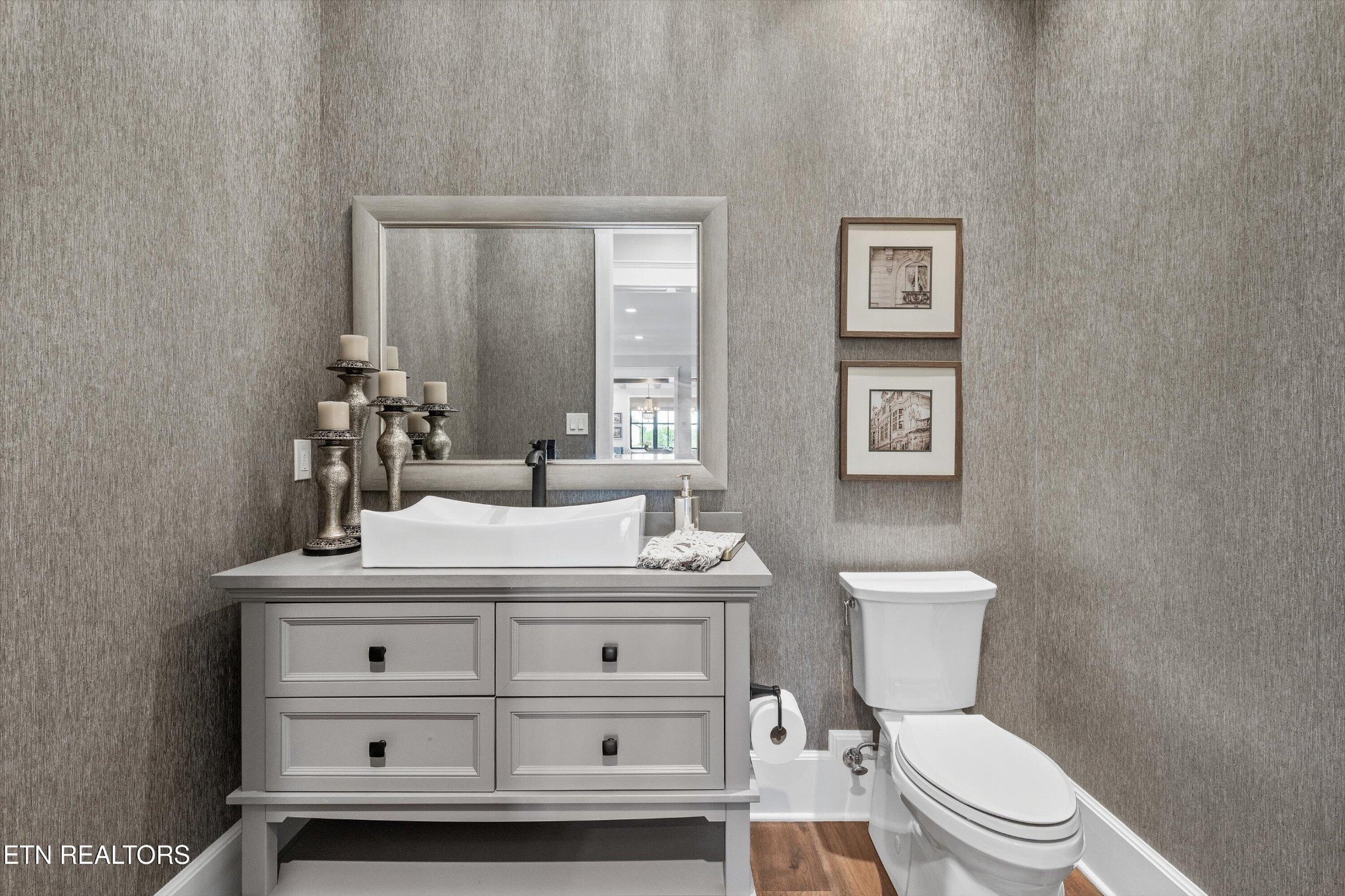 1748 Raulston Road Maryville, TN 37803 - Photo 18 of 59 a bathroom with a sink a toilet and mirror