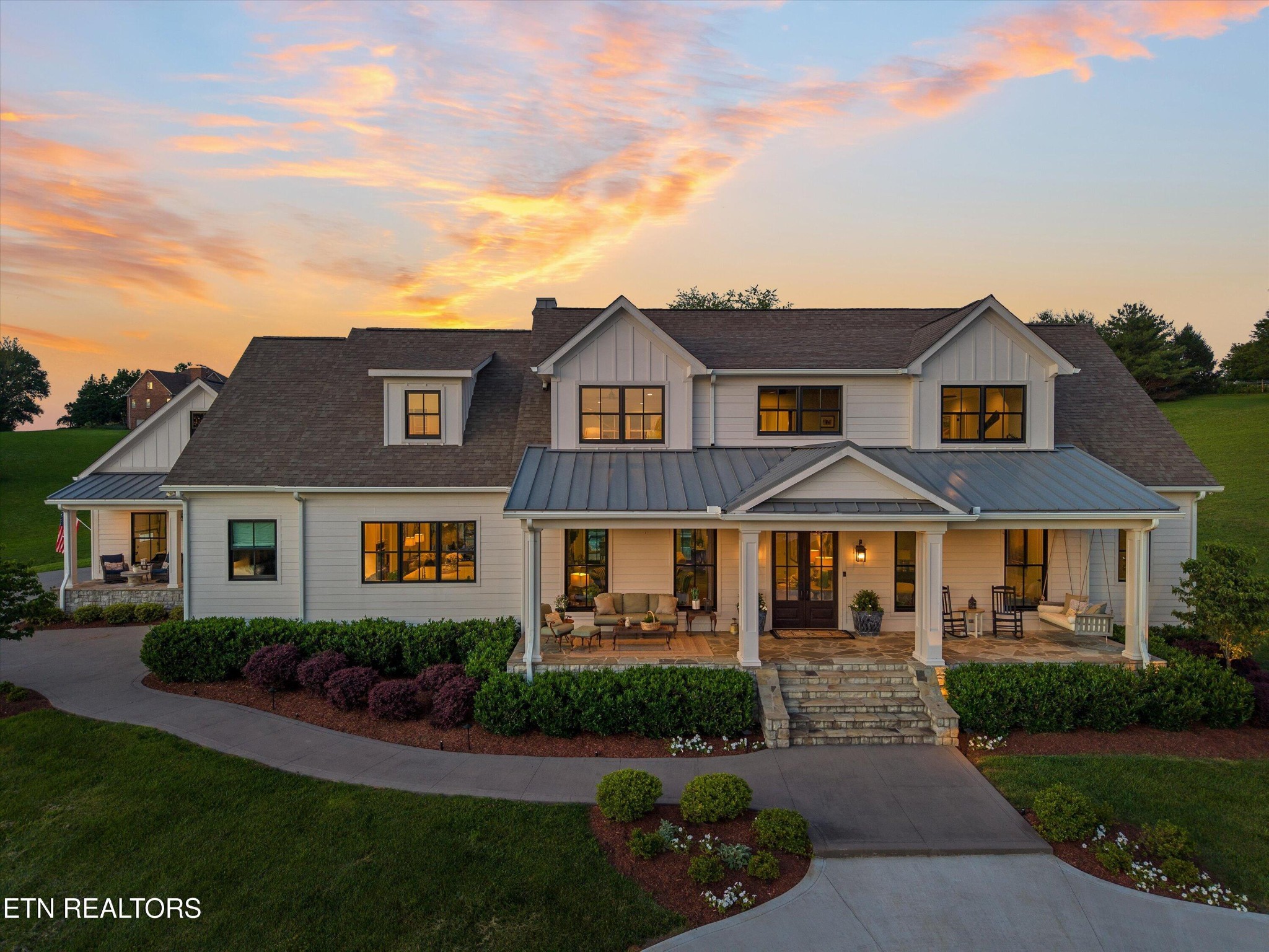 1748 Raulston Road Maryville, TN 37803 - Photo 2 of 59 a front view of a house with a yard and garage