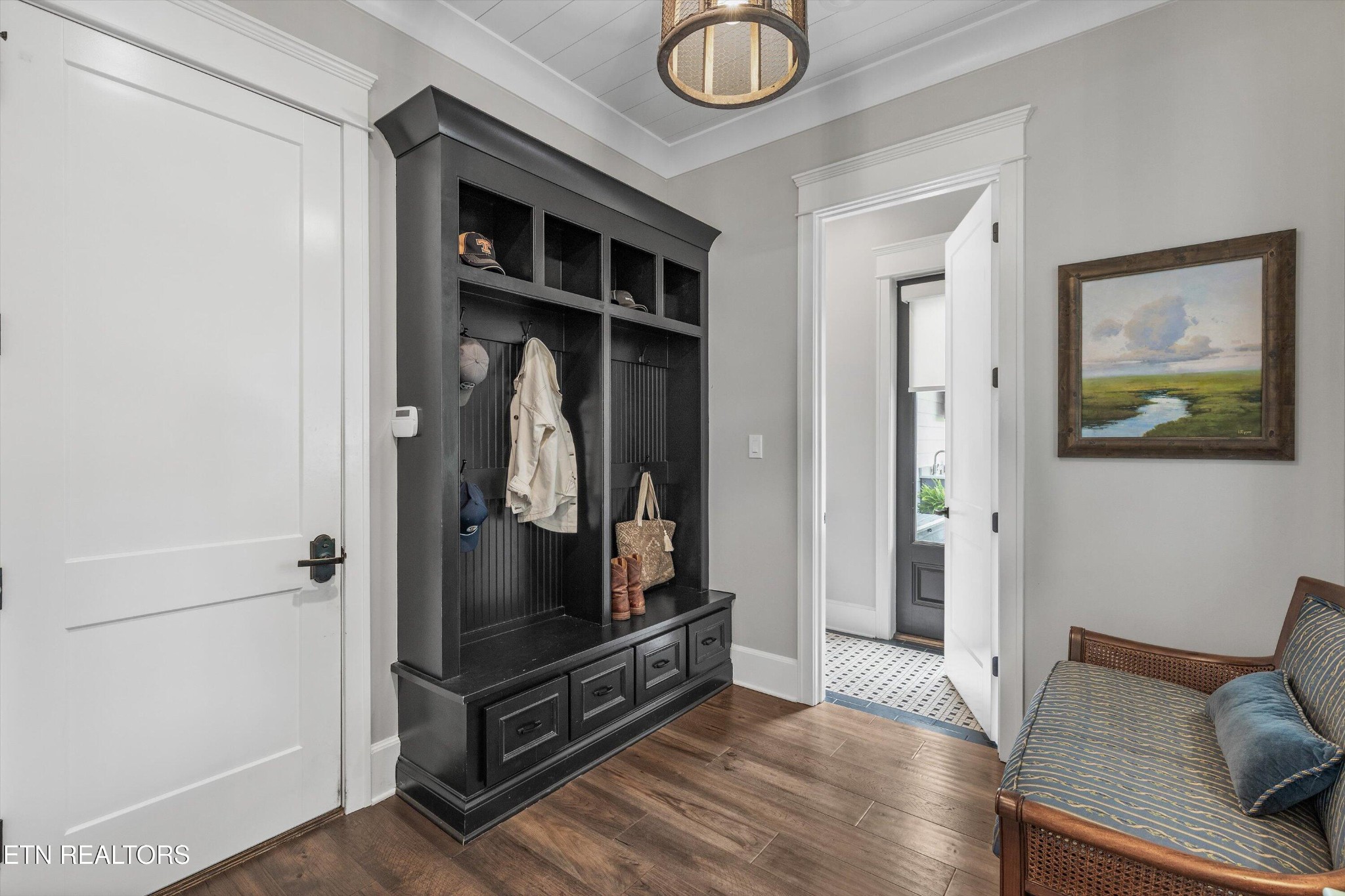 1748 Raulston Road Maryville, TN 37803 - Photo 27 of 59 a room with wooden floor and couch