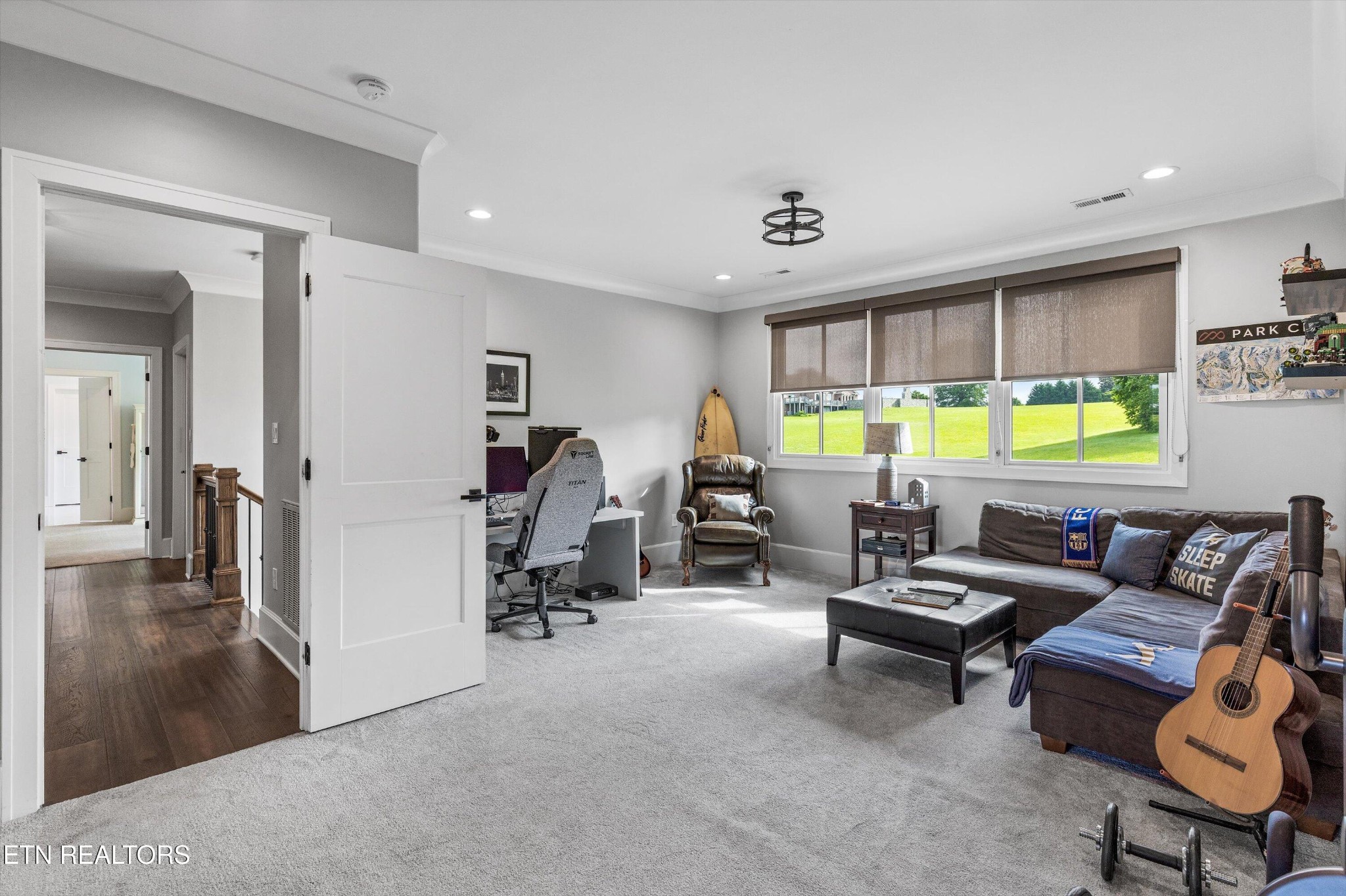1748 Raulston Road Maryville, TN 37803 - Photo 32 of 59 a living room with furniture and a large window